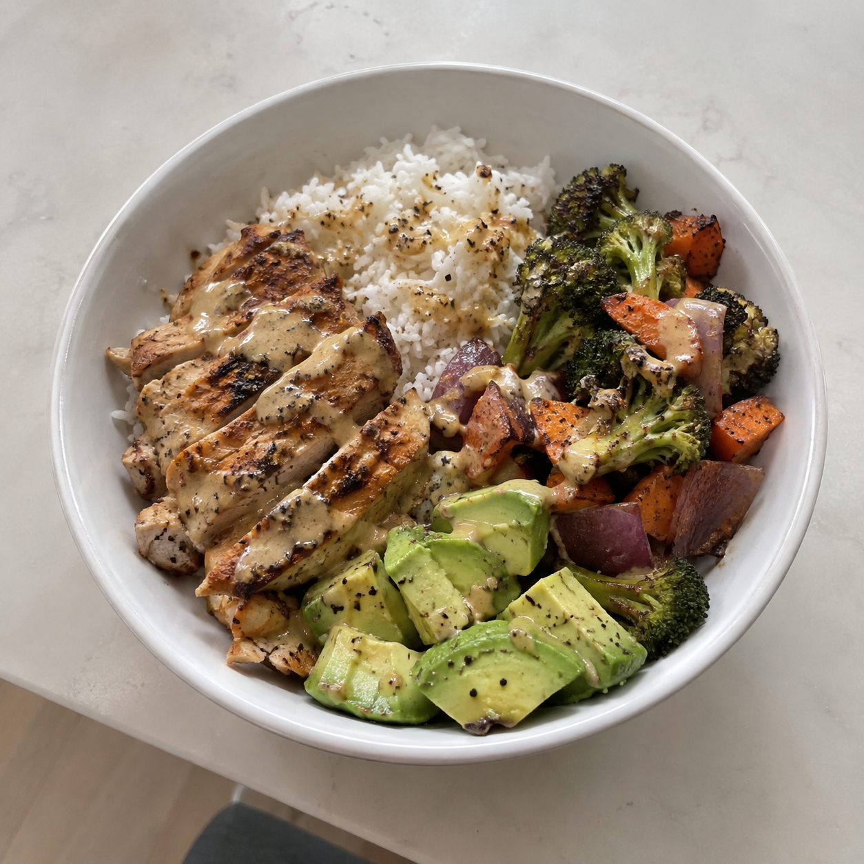 Chicken, rice, vegetables and avocado sent to the coach